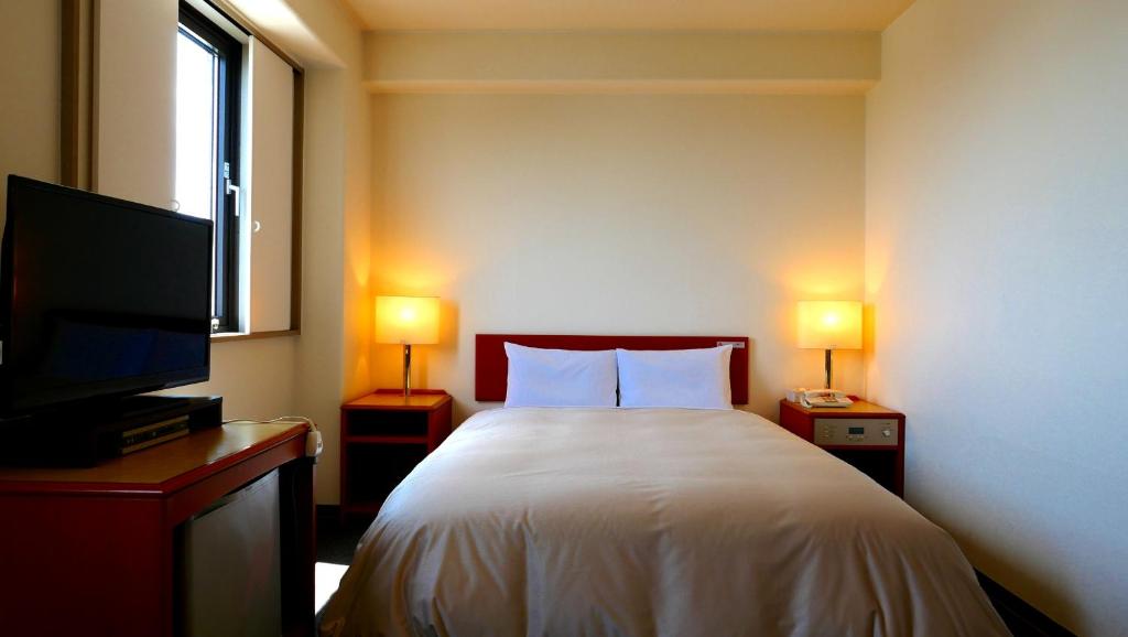 TV a/nebo společenská místnost v ubytování Tourist Hotel Hitachi