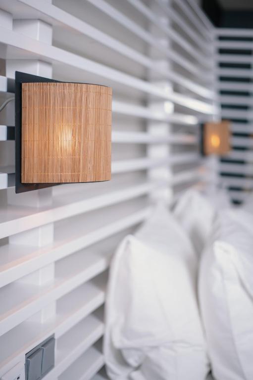 Postel nebo postele na pokoji v ubytování Nobel Hotel Ameland