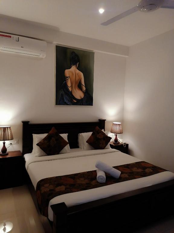 Postel nebo postele na pokoji v ubytování Hotel Bamiyan