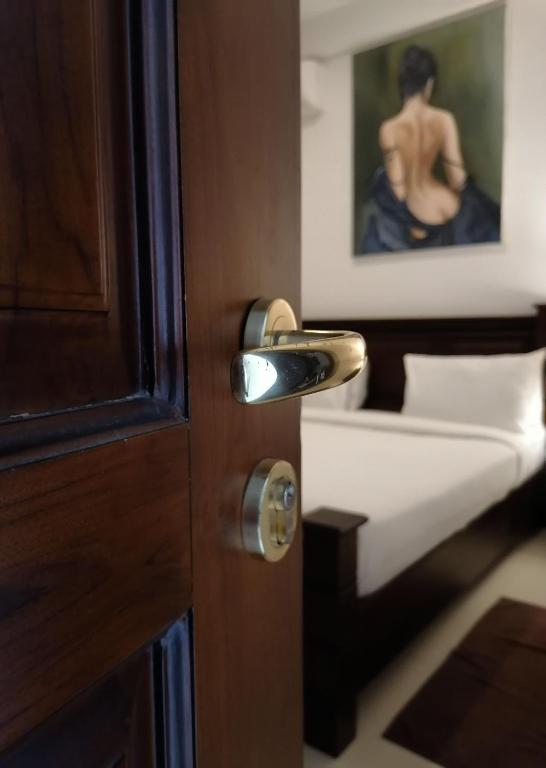Postel nebo postele na pokoji v ubytování Hotel Bamiyan