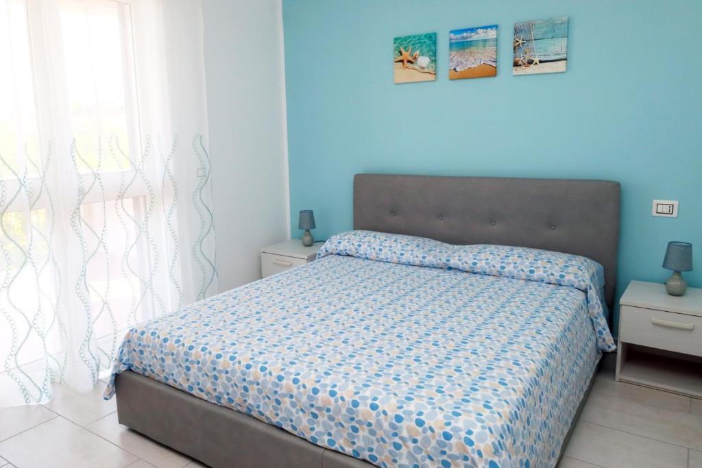 Posteľ alebo postele v izbe v ubytovaní B&B Torre Nave