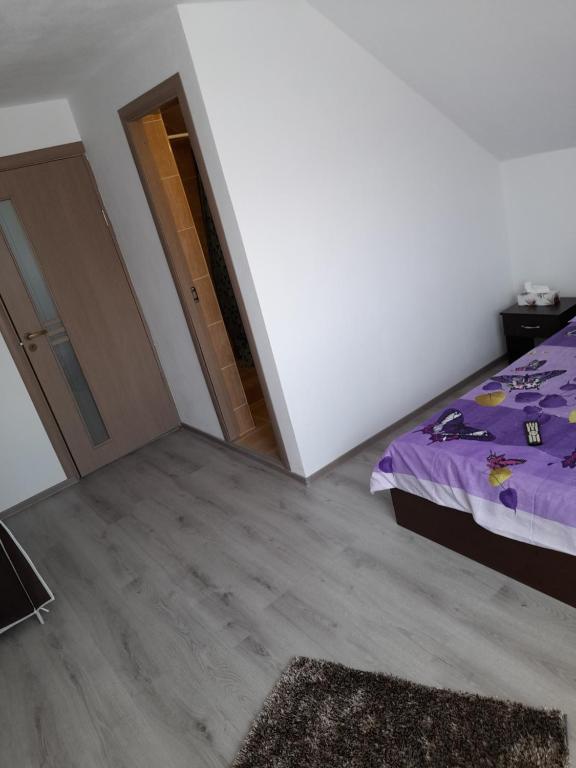 Postel nebo postele na pokoji v ubytování Casa Alex