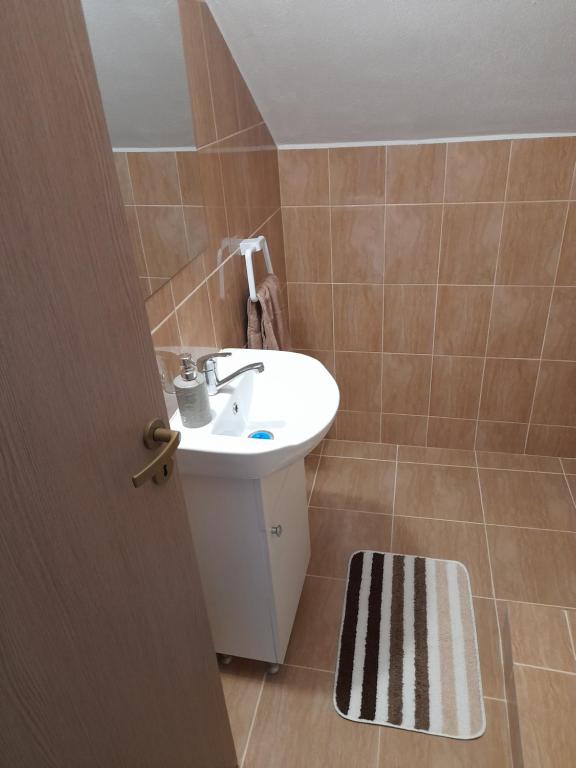 Koupelna v ubytování Casa Alex
