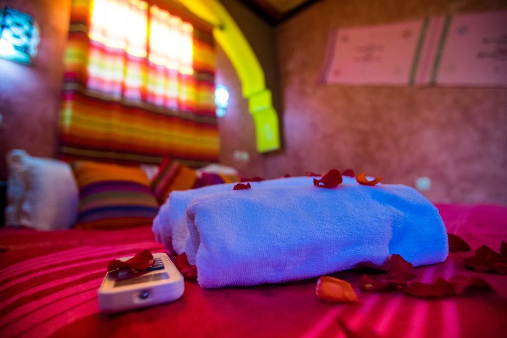 Postel nebo postele na pokoji v ubytování Kasbah Imlil