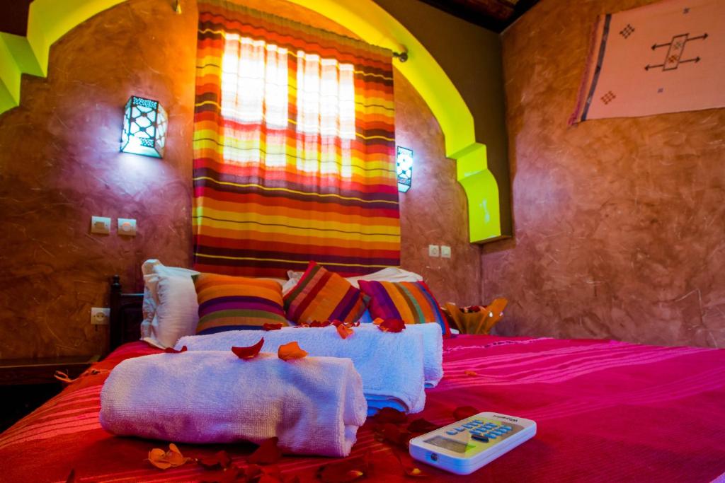 Postel nebo postele na pokoji v ubytování Kasbah Imlil