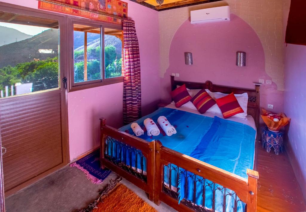 Postel nebo postele na pokoji v ubytování Kasbah Imlil