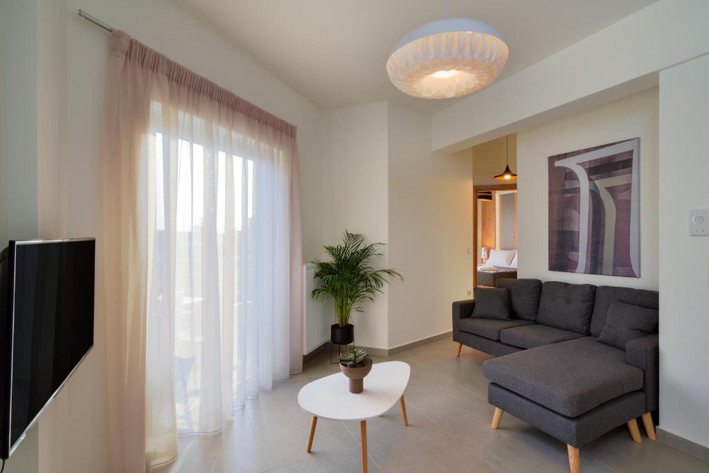 Telewizja i/lub zestaw kina domowego w obiekcie Elia Residences