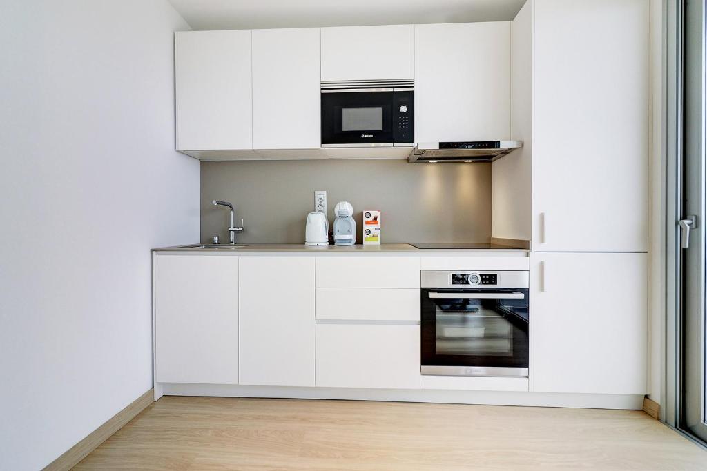 Kuchyň nebo kuchyňský kout v ubytování Alse Homes Adeje