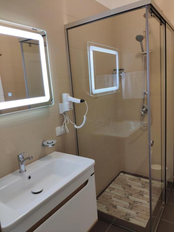 Koupelna v ubytování Hotel TREVA