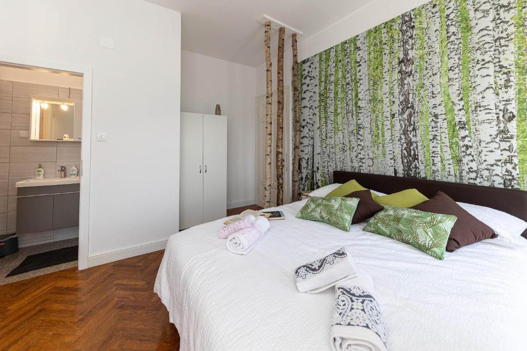 Postel nebo postele na pokoji v ubytování Apartmani Kaiserin