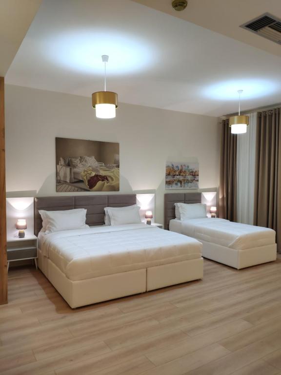 Postel nebo postele na pokoji v ubytování Hotel TREVA
