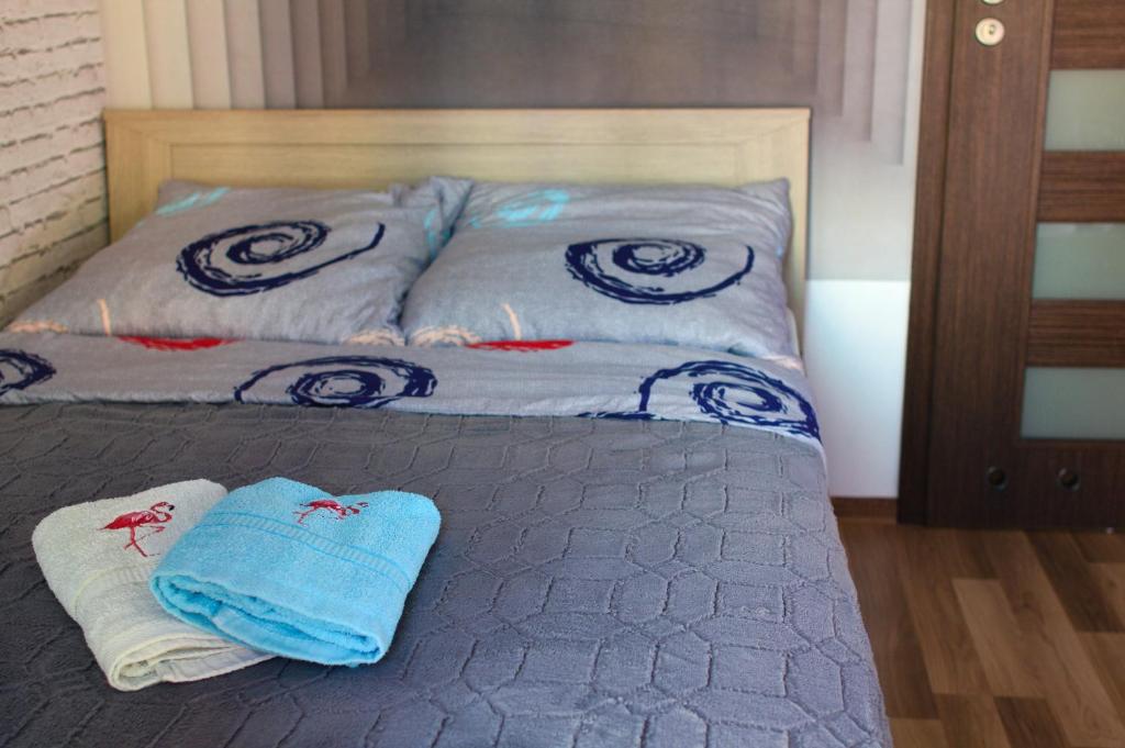 Posteľ alebo postele v izbe v ubytovaní Apartament Tiffany