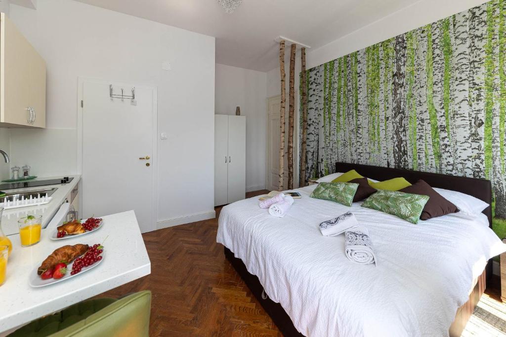 Postel nebo postele na pokoji v ubytování Apartmani Kaiserin