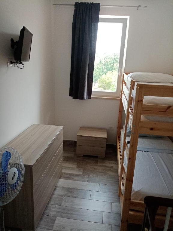 Postel nebo postele na pokoji v ubytování Villa Chirilú