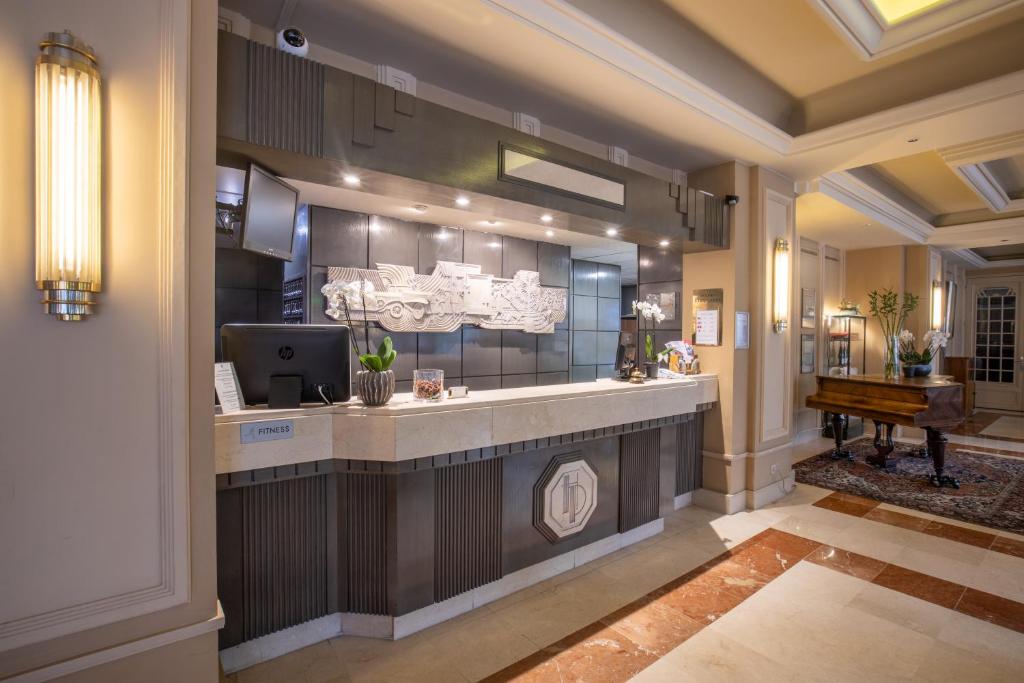 Kuchyň nebo kuchyňský kout v ubytování Hotel Du Parc - Mulhouse Centre