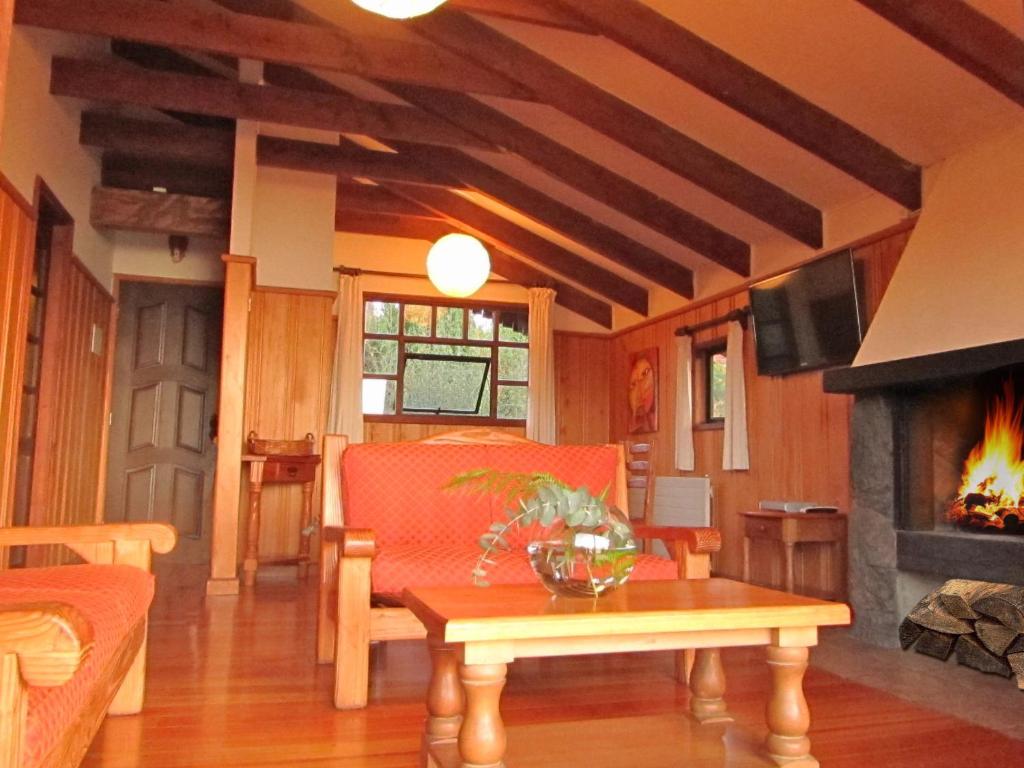 Area soggiorno di Cabañas Portal Pucon