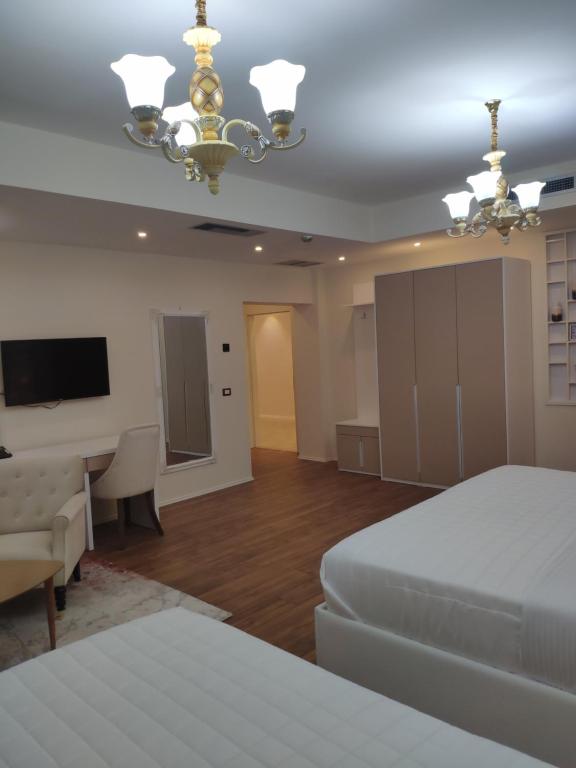 Postel nebo postele na pokoji v ubytování Hotel TREVA