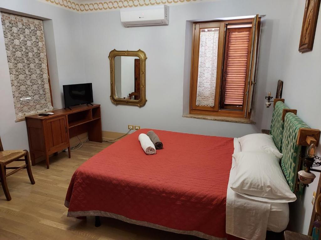 Postel nebo postele na pokoji v ubytování Pantorano rooms
