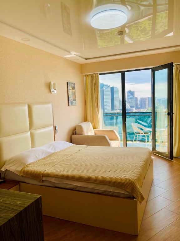 Postel nebo postele na pokoji v ubytování Sea view apartments Orbi Beach Tower