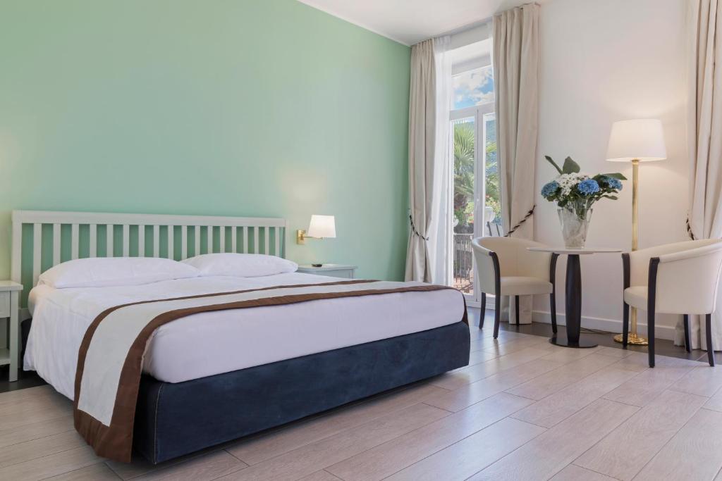 Vuode tai vuoteita majoituspaikassa Hotel Lido Seegarten