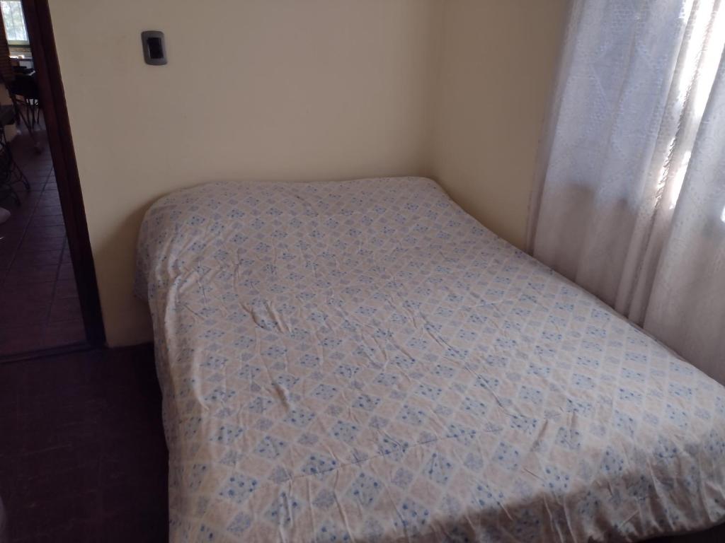 Una cama o camas en una habitación de 11.11