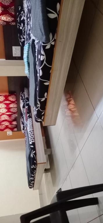 Postel nebo postele na pokoji v ubytování Hotel Laxmi Sadan