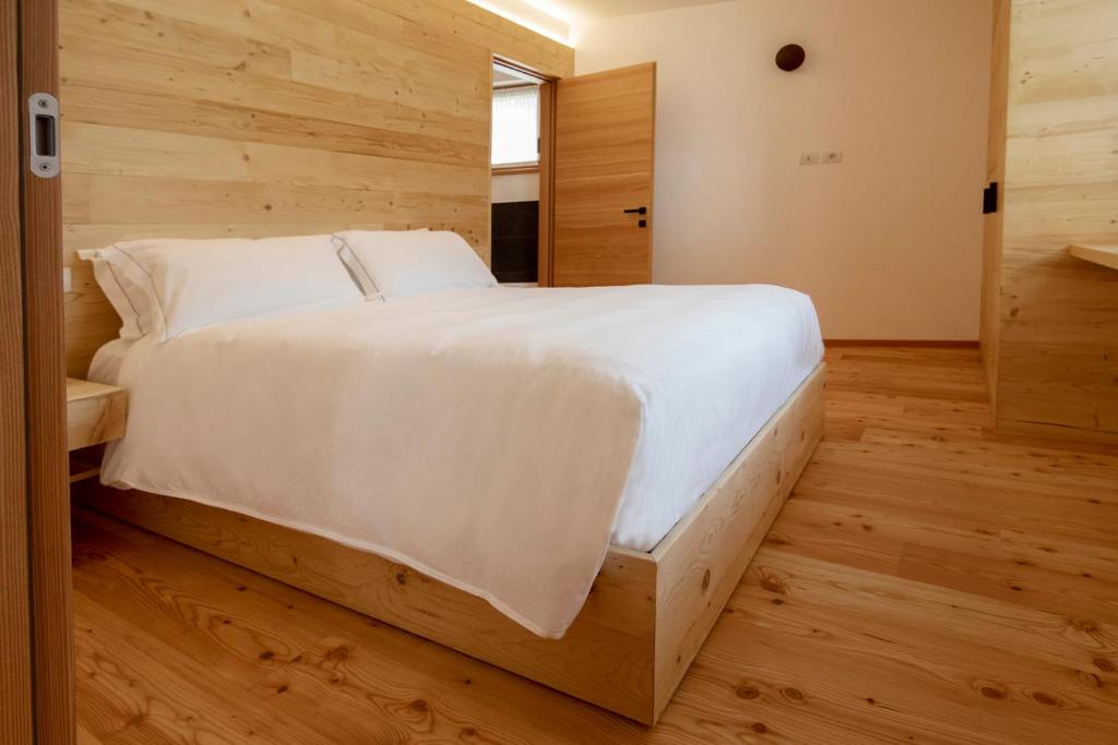 Ένα ή περισσότερα κρεβάτια σε δωμάτιο στο Chalet del Capriolo