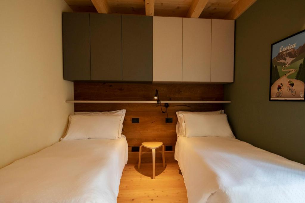 Ένα ή περισσότερα κρεβάτια σε δωμάτιο στο Chalet del Capriolo