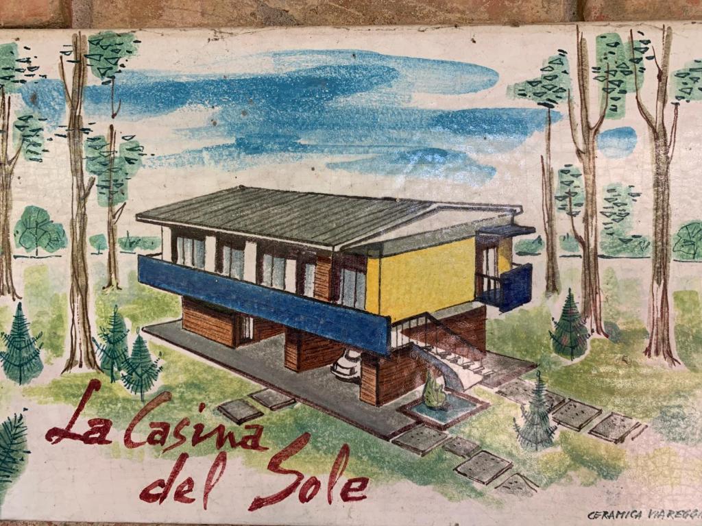 eine Zeichnung eines Hauses an einer Wand in der Unterkunft La casina del sole in Marina di Pietrasanta