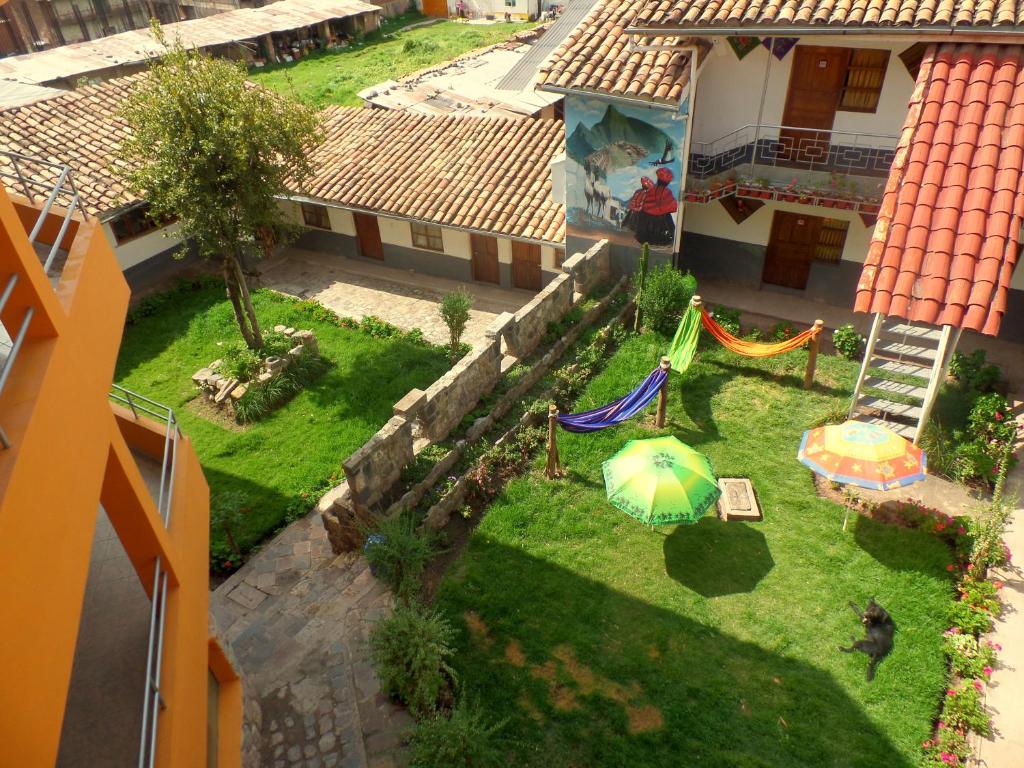an aerial view of a yard with a playground at Wake Up Cusco in Cusco