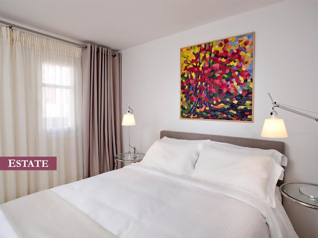 Posteľ alebo postele v izbe v ubytovaní Rimondi Boutique Hotel - Small Luxury Hotels of the World