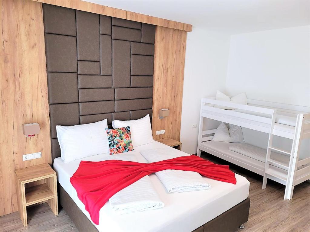 Postel nebo postele na pokoji v ubytování Sylpaulerhof Aparthotel