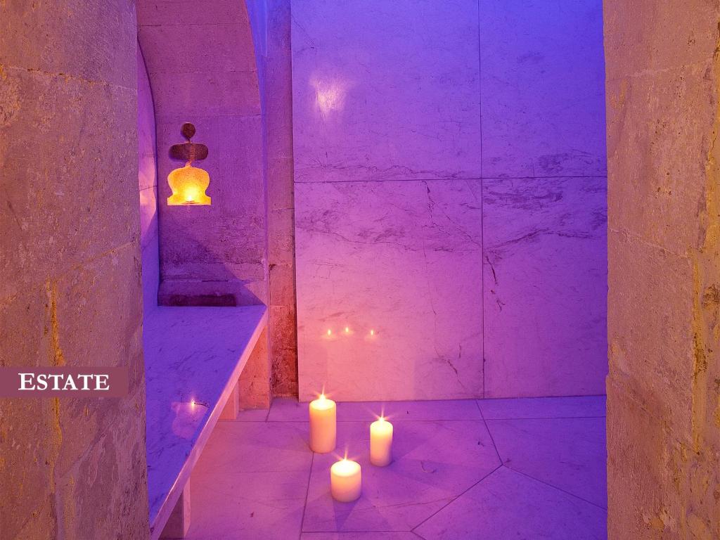Posteľ alebo postele v izbe v ubytovaní Rimondi Boutique Hotel - Small Luxury Hotels of the World