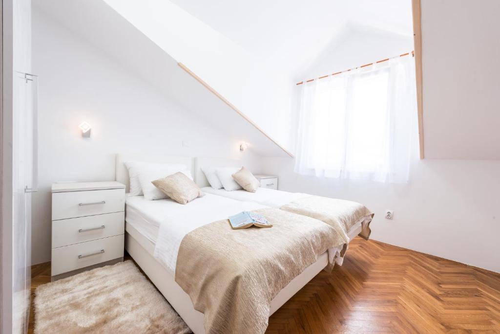 Postel nebo postele na pokoji v ubytování SB Apartment JOY