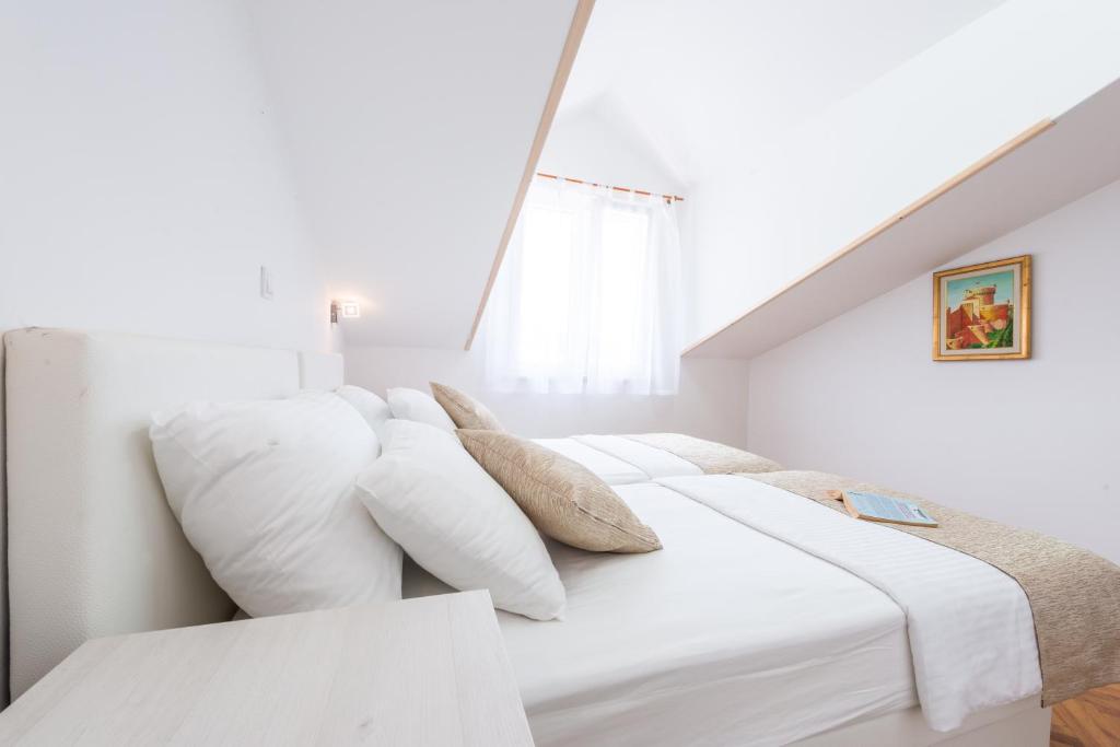 Postel nebo postele na pokoji v ubytování SB Apartment JOY