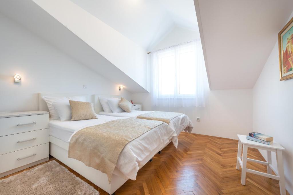 Postel nebo postele na pokoji v ubytování SB Apartment JOY