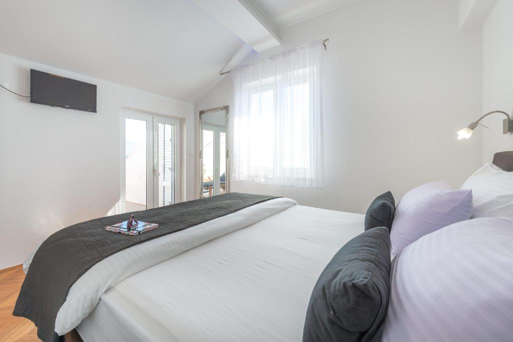 Postel nebo postele na pokoji v ubytování SB Apartment JOY