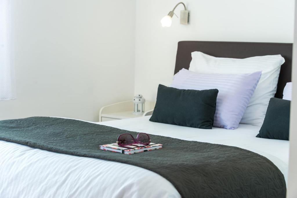 Postel nebo postele na pokoji v ubytování SB Apartment JOY