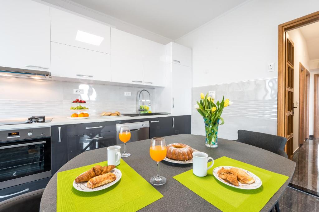 Kuchyň nebo kuchyňský kout v ubytování SB Apartment JOY