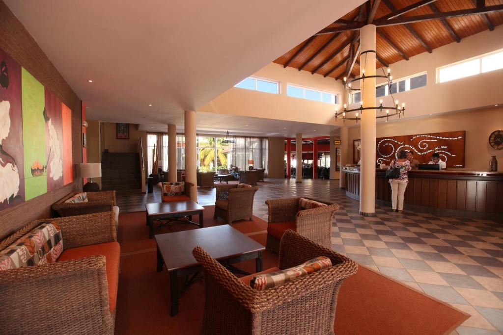 Posezení v ubytování Pestana Tropico Ocean & City Hotel