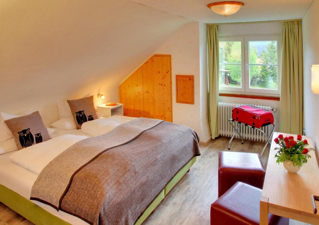 En eller flere senger på et rom på Schwarzwald-Chalet Feldberg