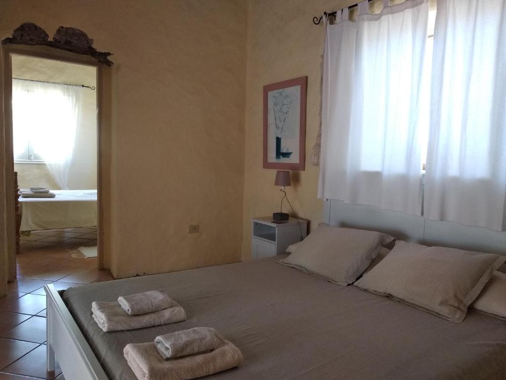 Postel nebo postele na pokoji v ubytování Villa El Perinqué