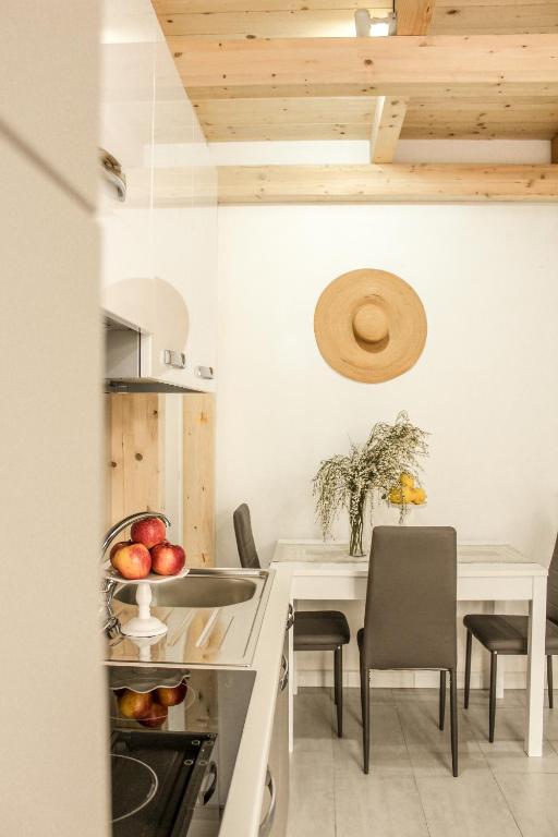 A kitchen or kitchenette at B&B Oplonti Resort