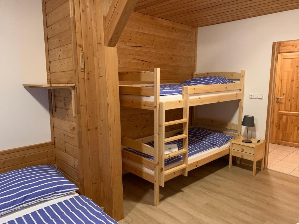 Postel nebo postele na pokoji v ubytování Penzion a Restaurace Vyhlídka