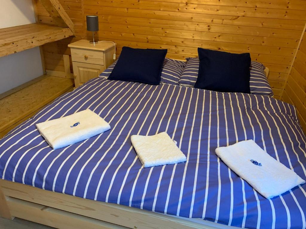Postel nebo postele na pokoji v ubytování Penzion a Restaurace Vyhlídka
