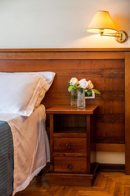 Postel nebo postele na pokoji v ubytování Hotel Terme Posta Padova HOTEL RC12