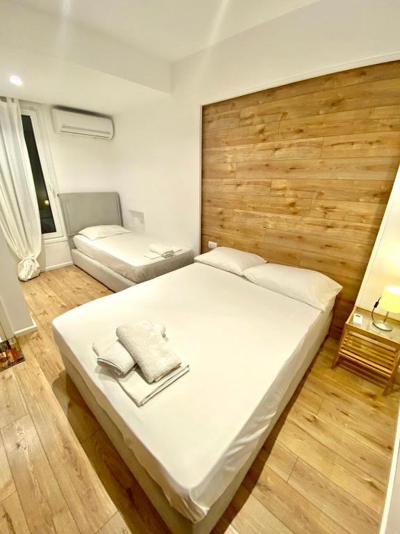Uma cama ou camas num quarto em Hotel Aulona