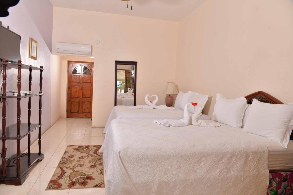 Postel nebo postele na pokoji v ubytování Chateau Margarita JA