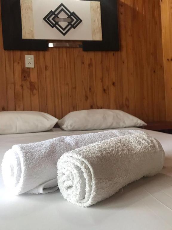 Postel nebo postele na pokoji v ubytování El Pindo Iguazu