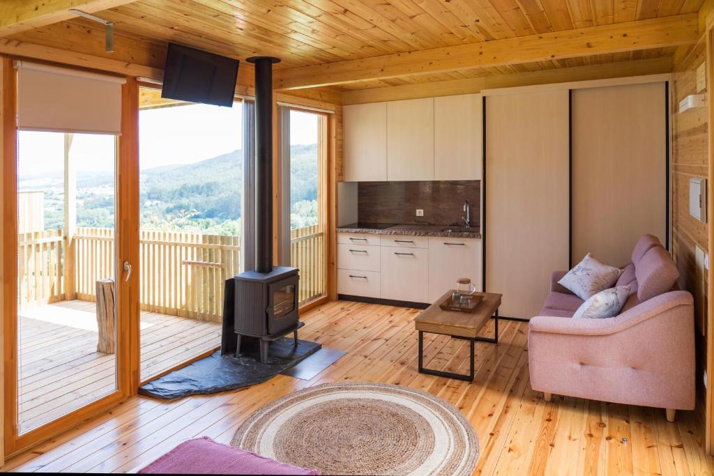 TV a/nebo společenská místnost v ubytování Cabanas de Canduas